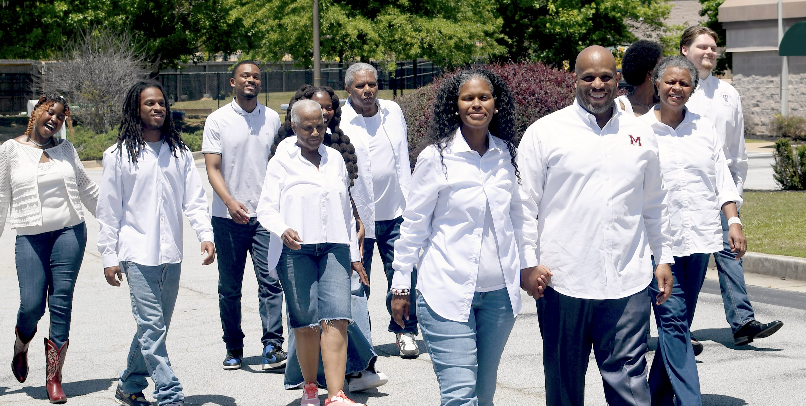 Reverend Leewalking with supporters
